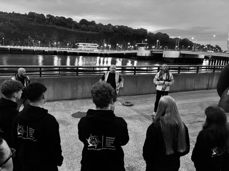 A briefing on the quay with the youth committee
