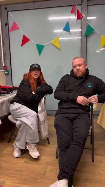 Chris and Jo-Ann at the Re-A-Suir base talking about the charity